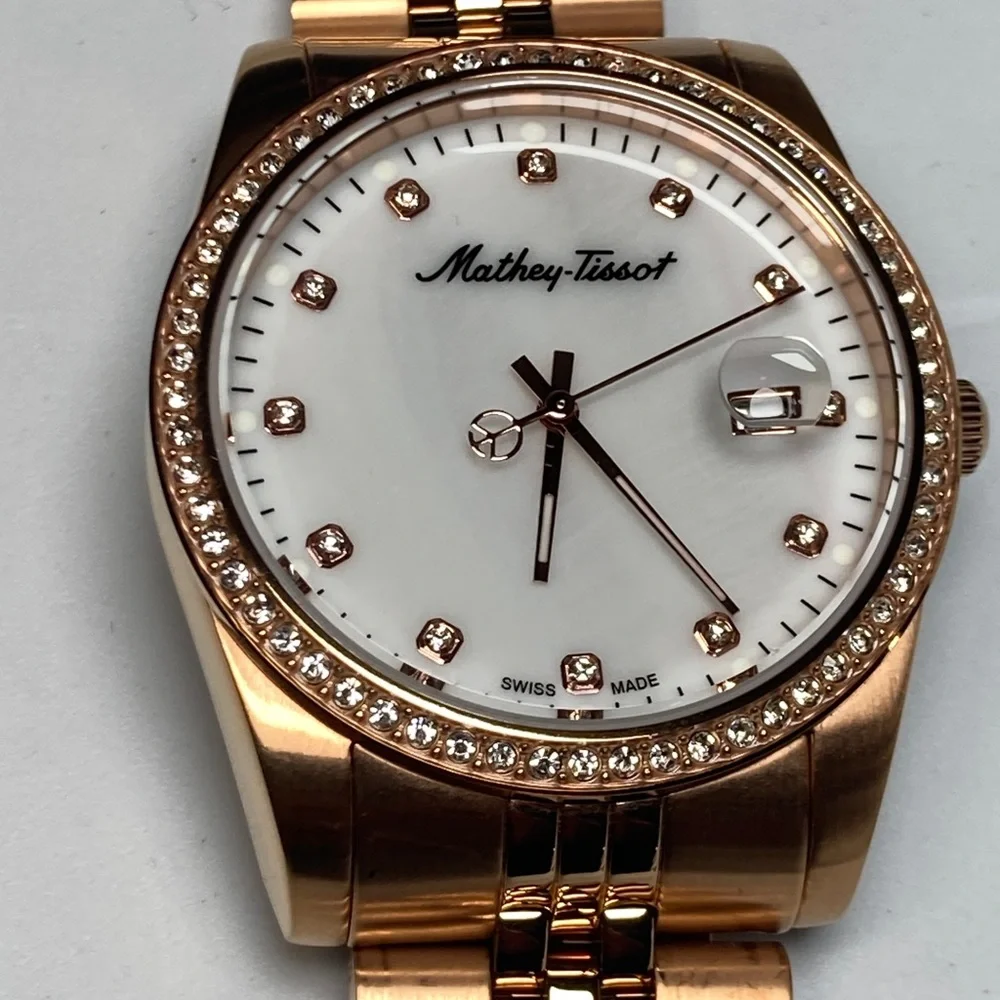Mathey Tissot H709 rose gold tone, white textured dial, new battery, stainless